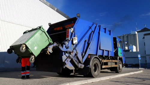 Residents disposing of household waste in Kingston upon Thames