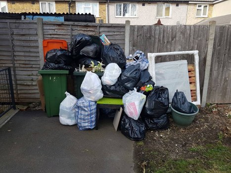 Waste clearance team removing furniture in Wimbledon