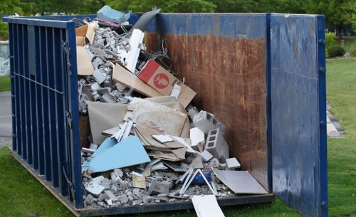 Professional team removing a sofa from a South London home