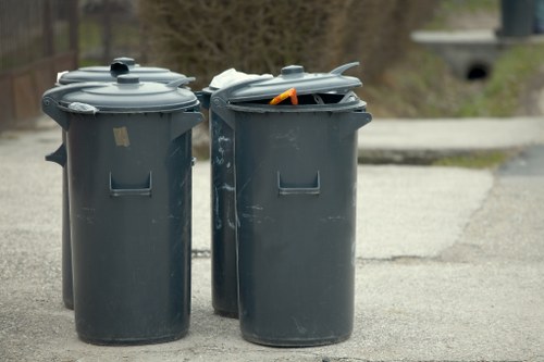 Waste collection trucks managing construction debris